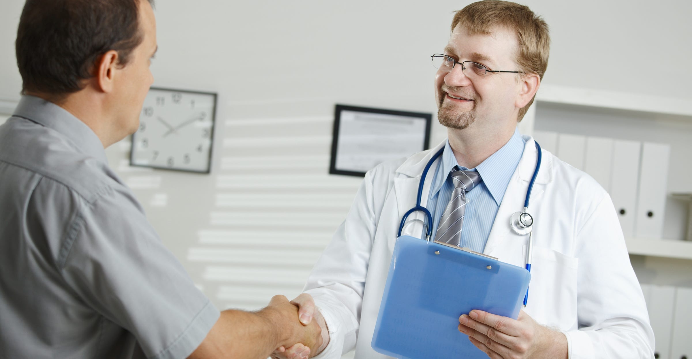 Patient thanking doctor for his services